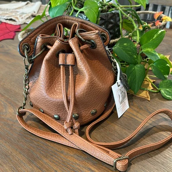 Jessica simpson bucket bag hot sale